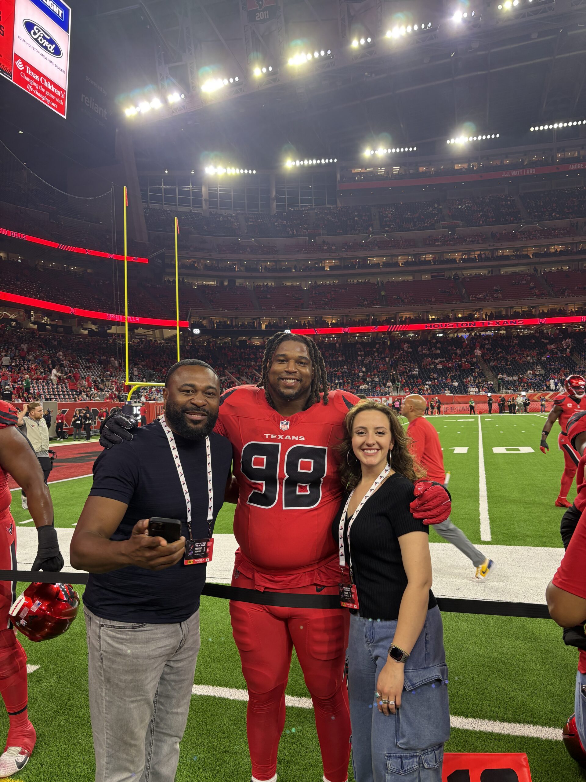 Tim Settle Jr. with Emanuel Drakes and Madi Wingert of Upper Edge Sports