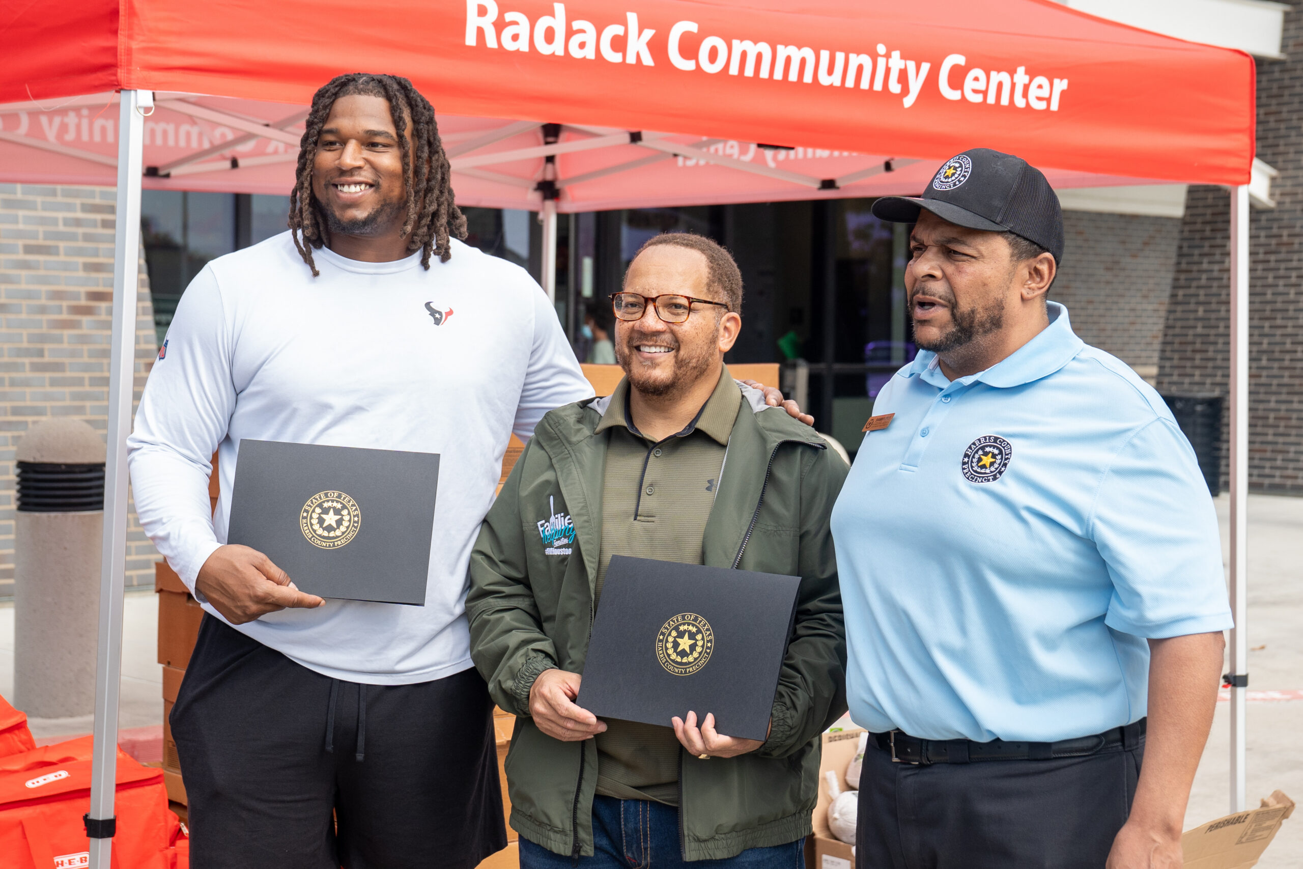 Tim Settle Jr. of the Houston Texans at his Thanksgiving event